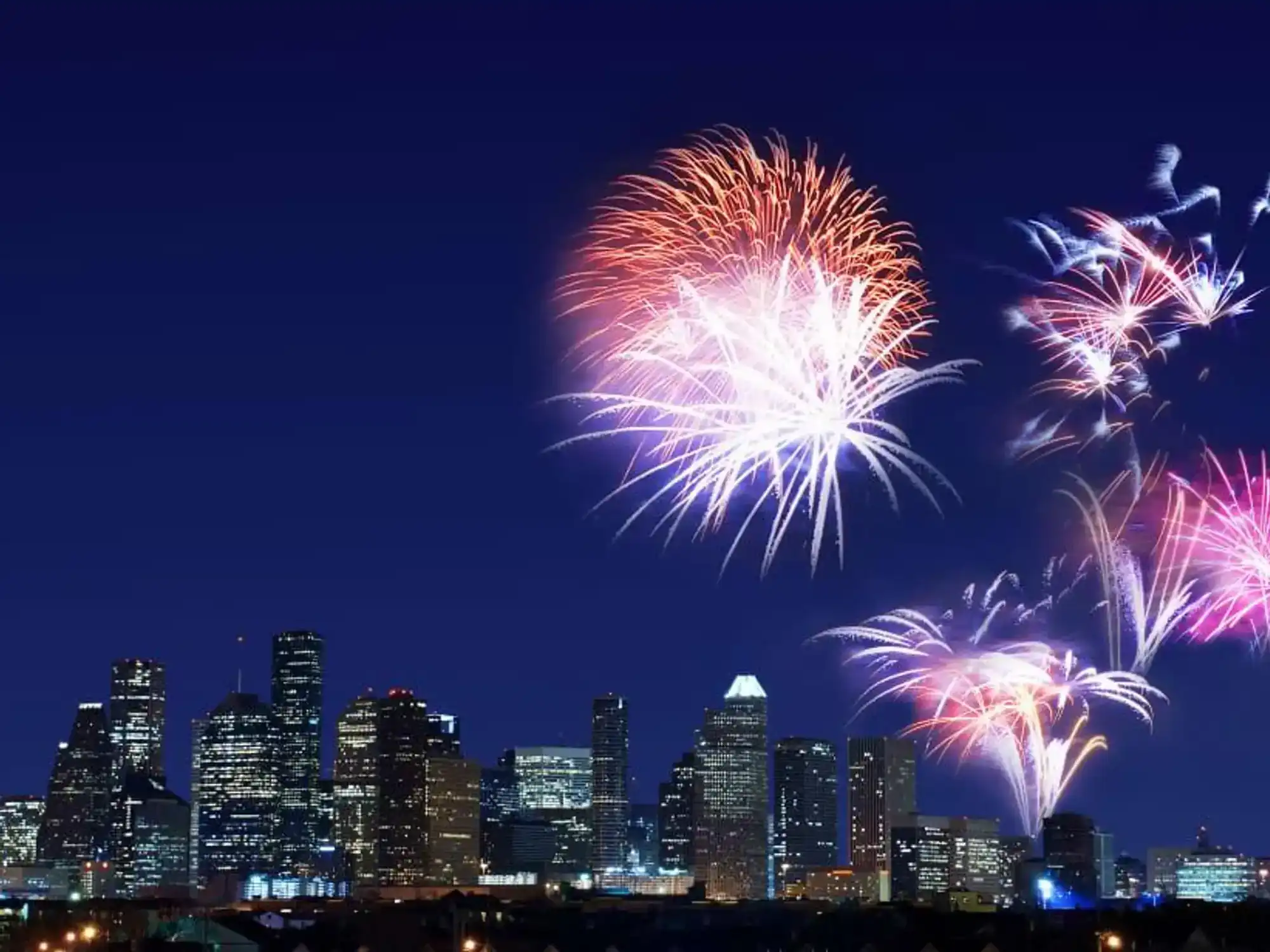 Fireworks over Houston skyline