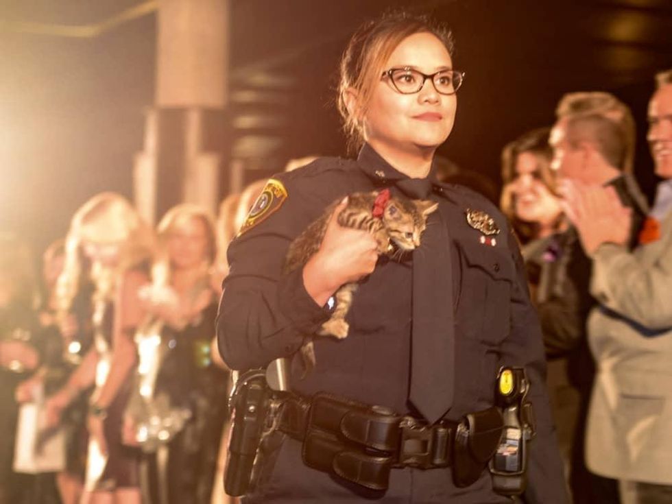 First responder and pet at Salute Houston fashion show