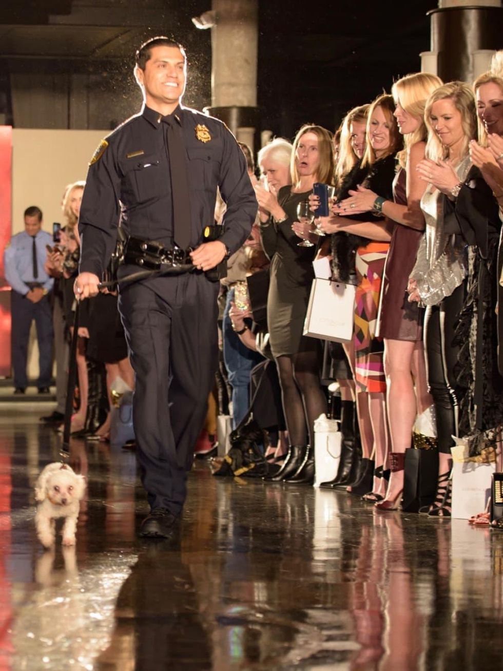 First responder and pet at Salute Houston fashion show