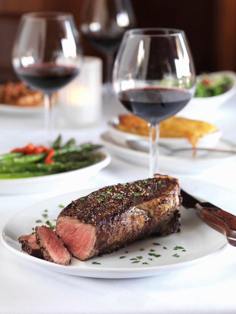 Fleming's Prime Steakhouse & Wine Bar peppercorn steak glass of wine
