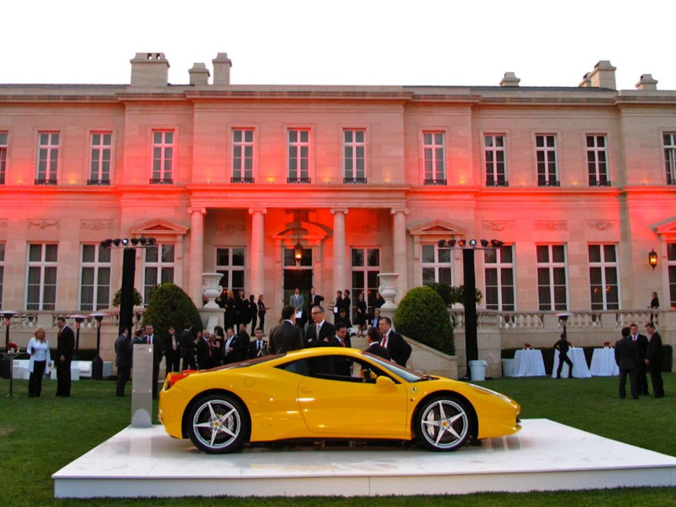 Fleur de Lys mansion with Ferrari in front Suzanne Saperstein