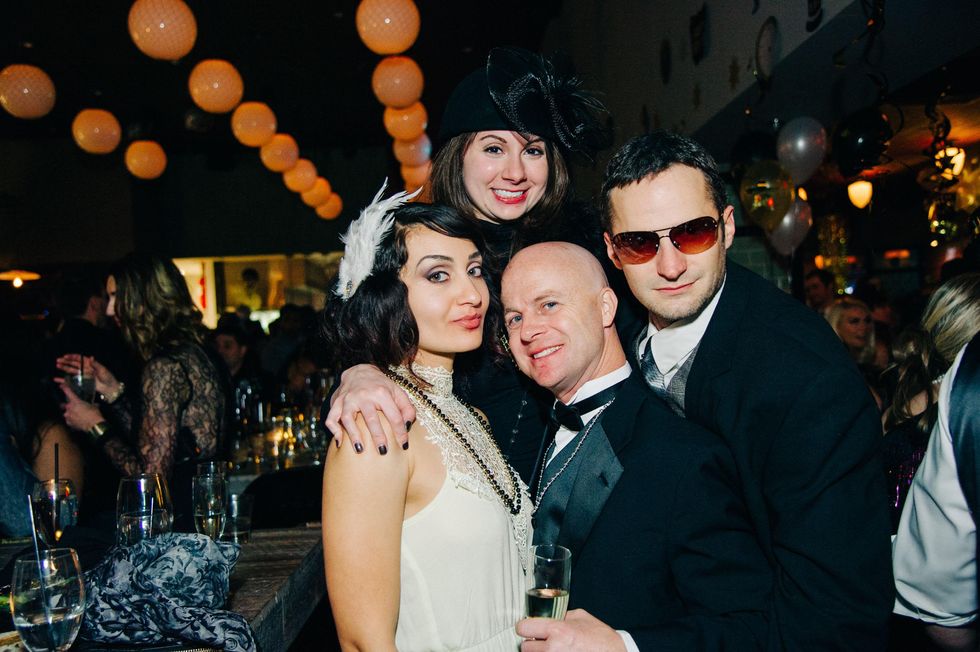 Francisca Torres, from left, Marisa Whitenton, James Wilson and Kyle Megera at New Year's Eve at Local Pour January 2015