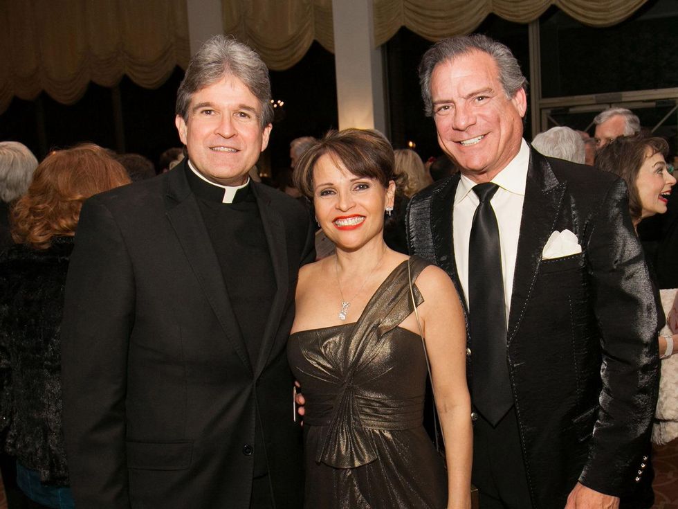Frank Rossi, from left, with Lucia and Michael Cordua at the University of St. Thomas Mardi Gras March 2014