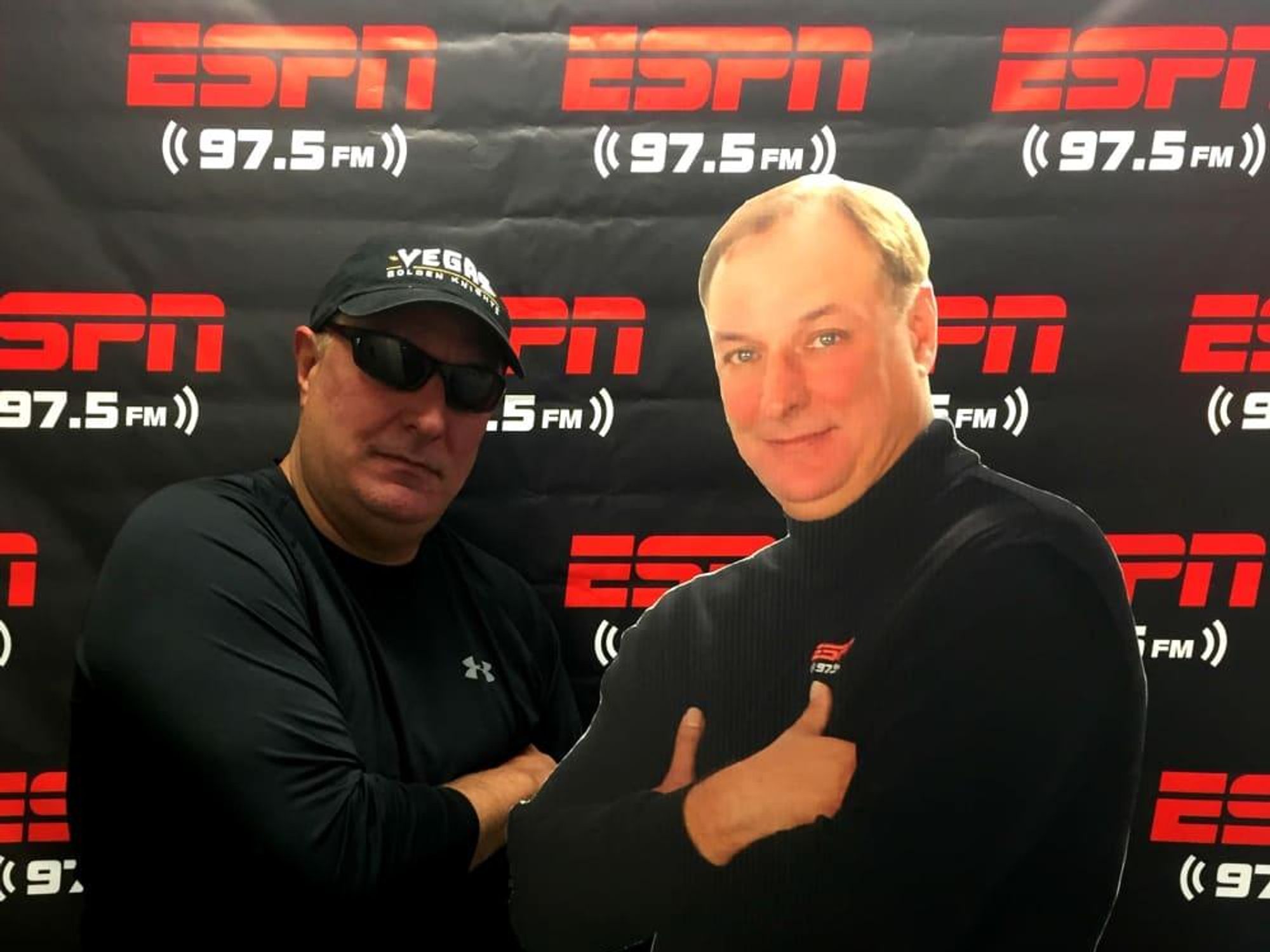 Fred Faour poses with his own cutout ESPN 97.5