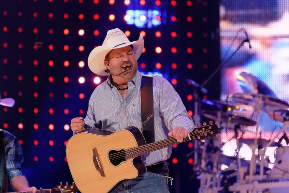 Garth Brooks opening night RodeoHouston eyes closed