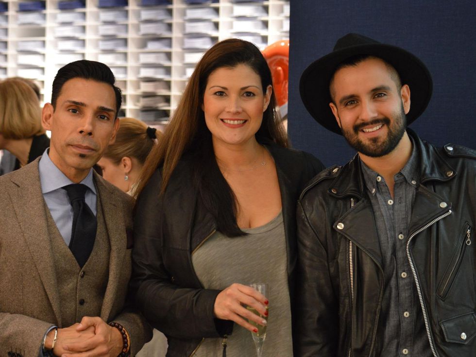 Geno Segura, from left, Kahia Perry and Vico Puentes at the Suitsupply Houston grand opening party December 2013