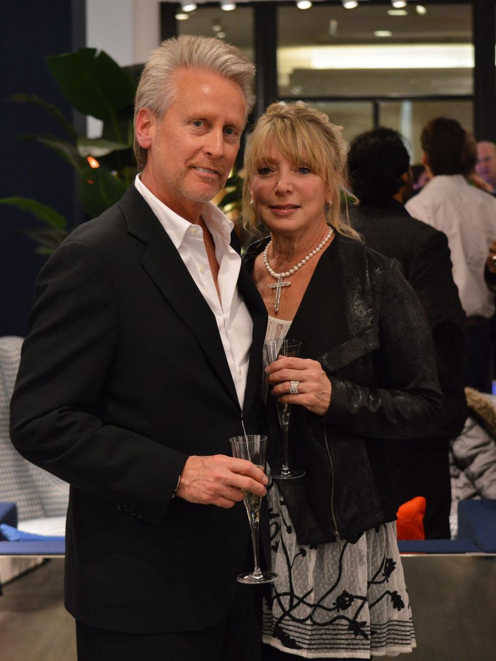 Gerry and Kenna Gibson at the Suitsupply Houston grand opening party December 2013