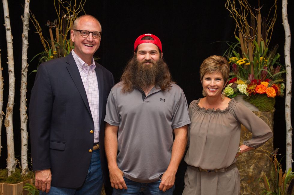 Gil Baumgarten, from left, Jep Robertson and Sue Baumgarten at the LifeHouse Houston Duck Dynasty dinner September 2014