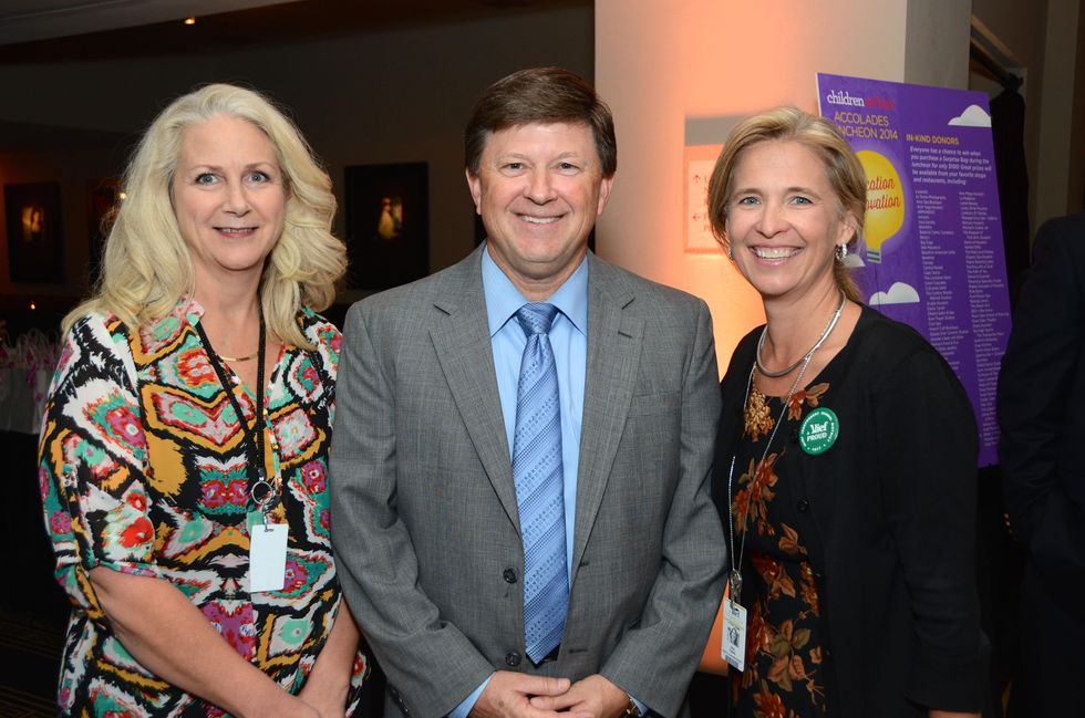 Gina Wentz, from left, H.D. Chambers and Gina Tomas at the Children at Risk luncheon October 2014