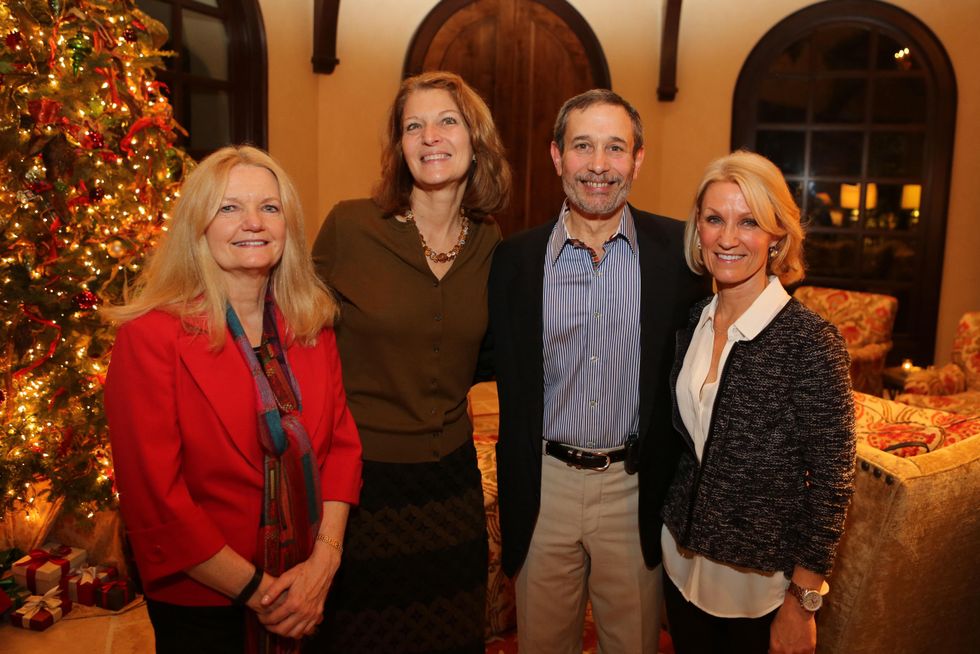 Ginya Trier, from left, Delphine Mendez de Leon, Dr. Mark Skolkin and Susan Hoffman at St. Luke's holiday party December 2014