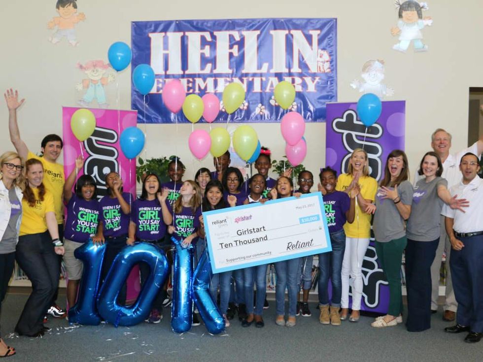 Girlstart receives $10,000 check from Reliant Gives