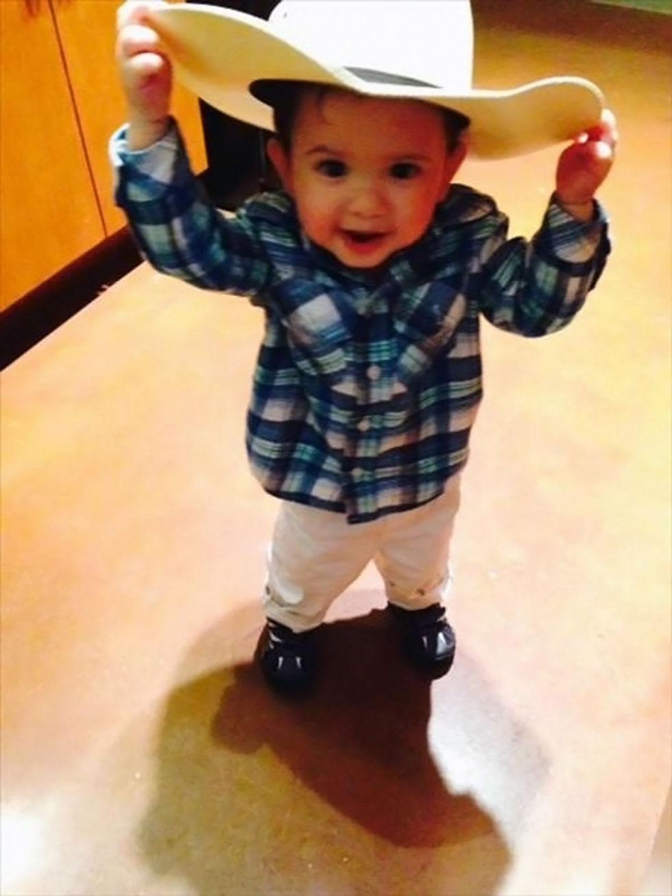 Go Texan Day February 2014 toddler with big cowboy hat