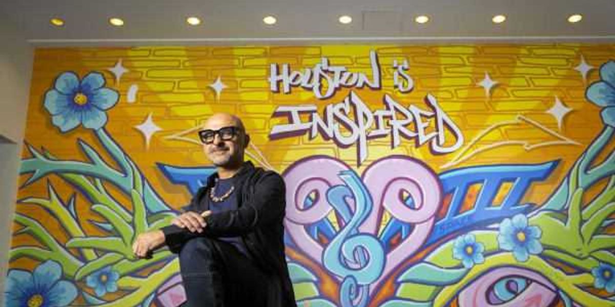 Noted Houston street artist paints vibrant new mural at downtown venue