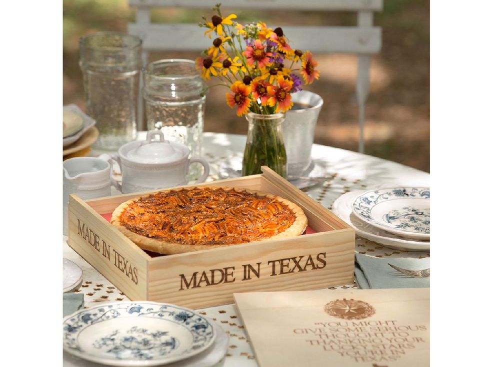Goode Co. pecan pie in box on table with flowers 2
