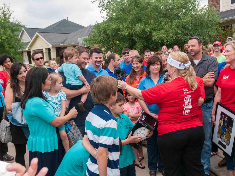 Gracepoint Homes and Keller Williams home renovation surprise May 2014 Crowd