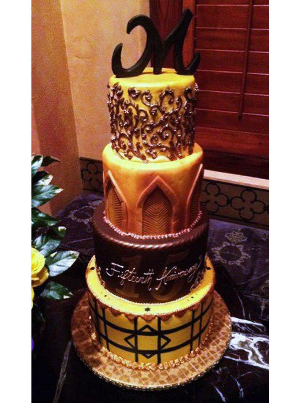 Gracie Nguyen pastry chef at Mark's American Cuisine injured in SXSW crash March 2014 Mark's 15th anniversary cake in April 2012