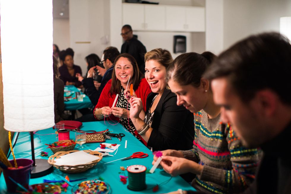Guests at the craft table at the MFAH Art Crowd Party November 2014