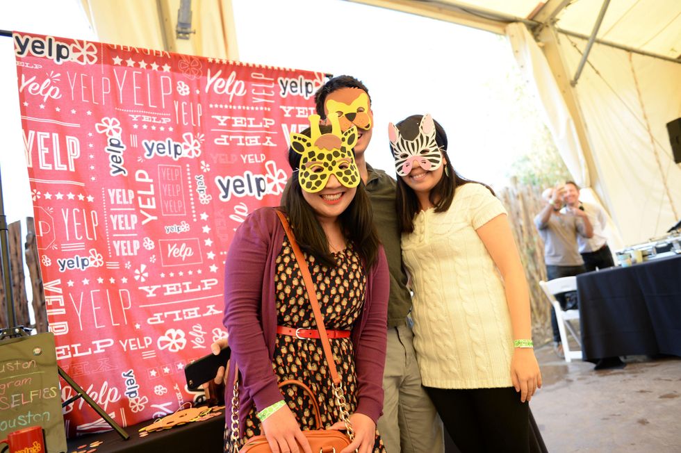 Guests at the Yelp Selfie Booth at Houston's Young Professionals Flock to a Beastly Brunch at the zoo February 2015