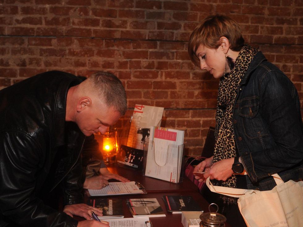 Guests signing up for CounterCurrent passes at the CounterCurrent Kick-Off March 2014 photo by George Hixson