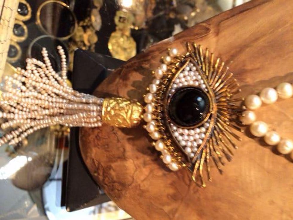 Gypsy jewelry designer Jeanette Simon with evil eye necklace