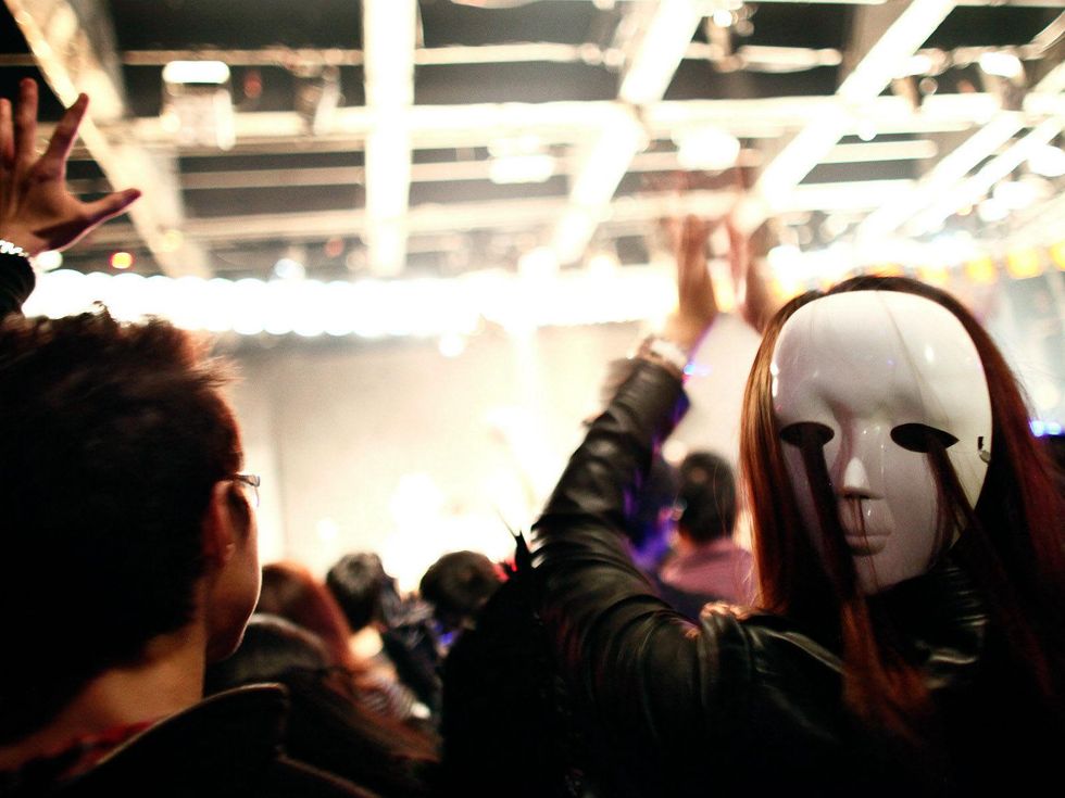 Halloween party with masked person