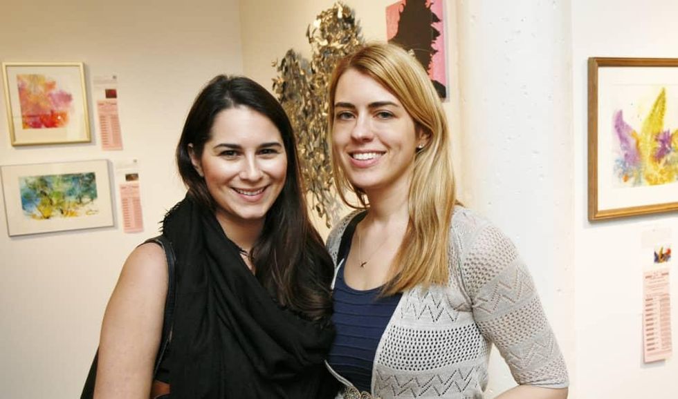 Hayley Perez and Tara Quell enjoy the diverse collection of artwork at the 19th annual Art on the Avenue Preview Party