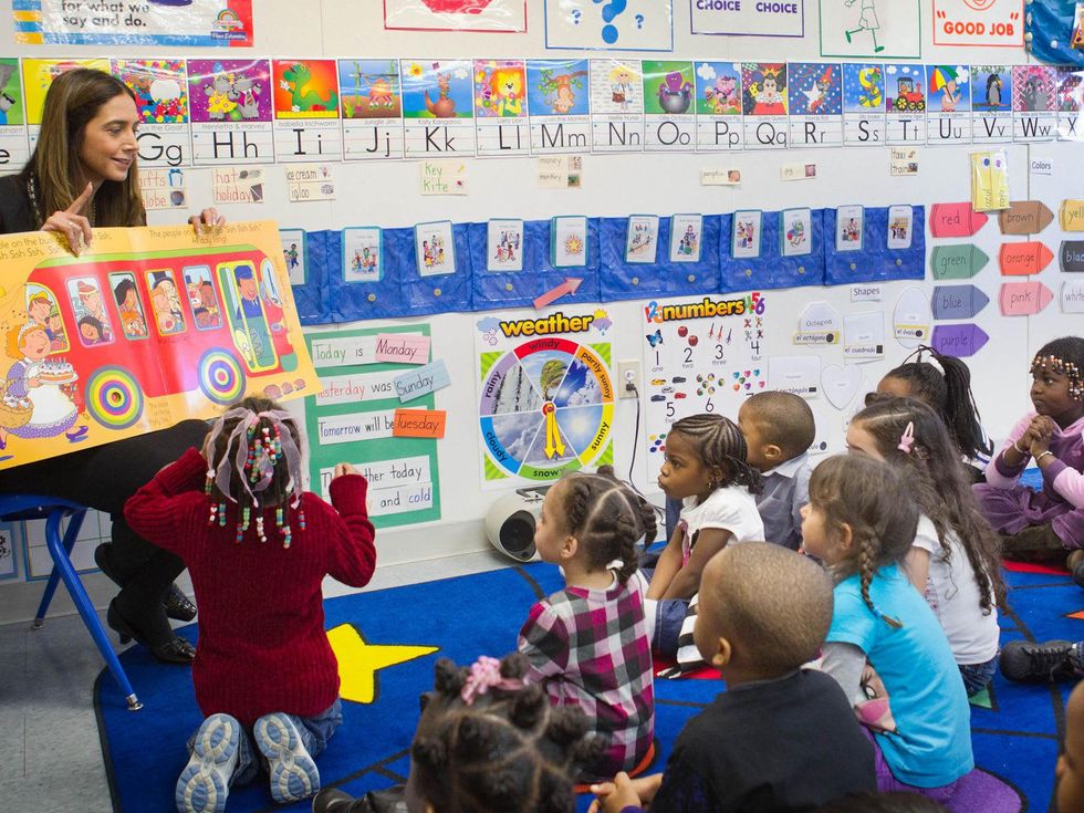 Head Start program with teacher and young students
