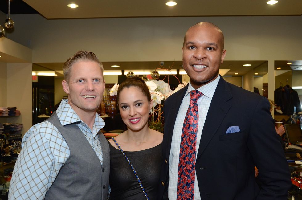 Heath LaPray, from left, Ana Paredes and Travis Torrence at the Festari Holiday Party December 2014