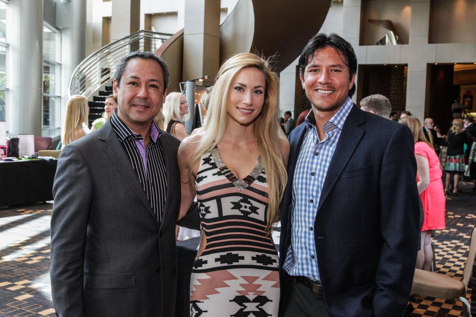 Hector Villarreal, from left, Elizabeth Eklund and Brian Ching at Boys & Girls Harbor luncheon April 2014