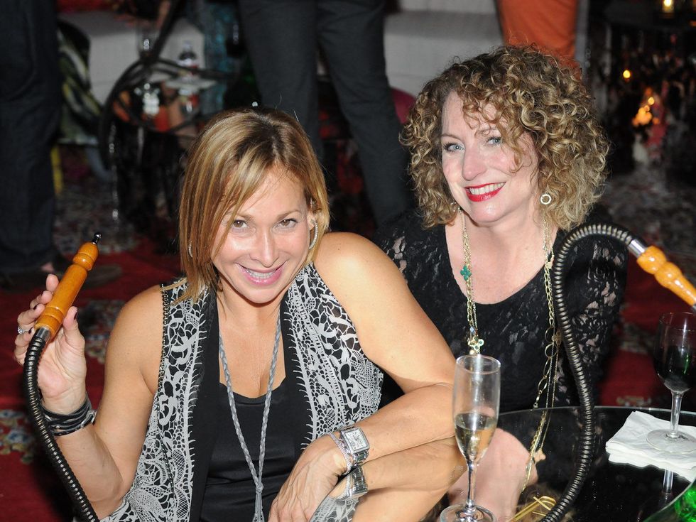 Heidi Dugan, left, and Karen Cook at the Q The Salon Moroccan theme party September 2013