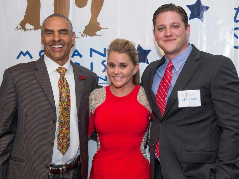Herm Edwards, Jayme Lamm, Travis Frey at Moran Norris gala