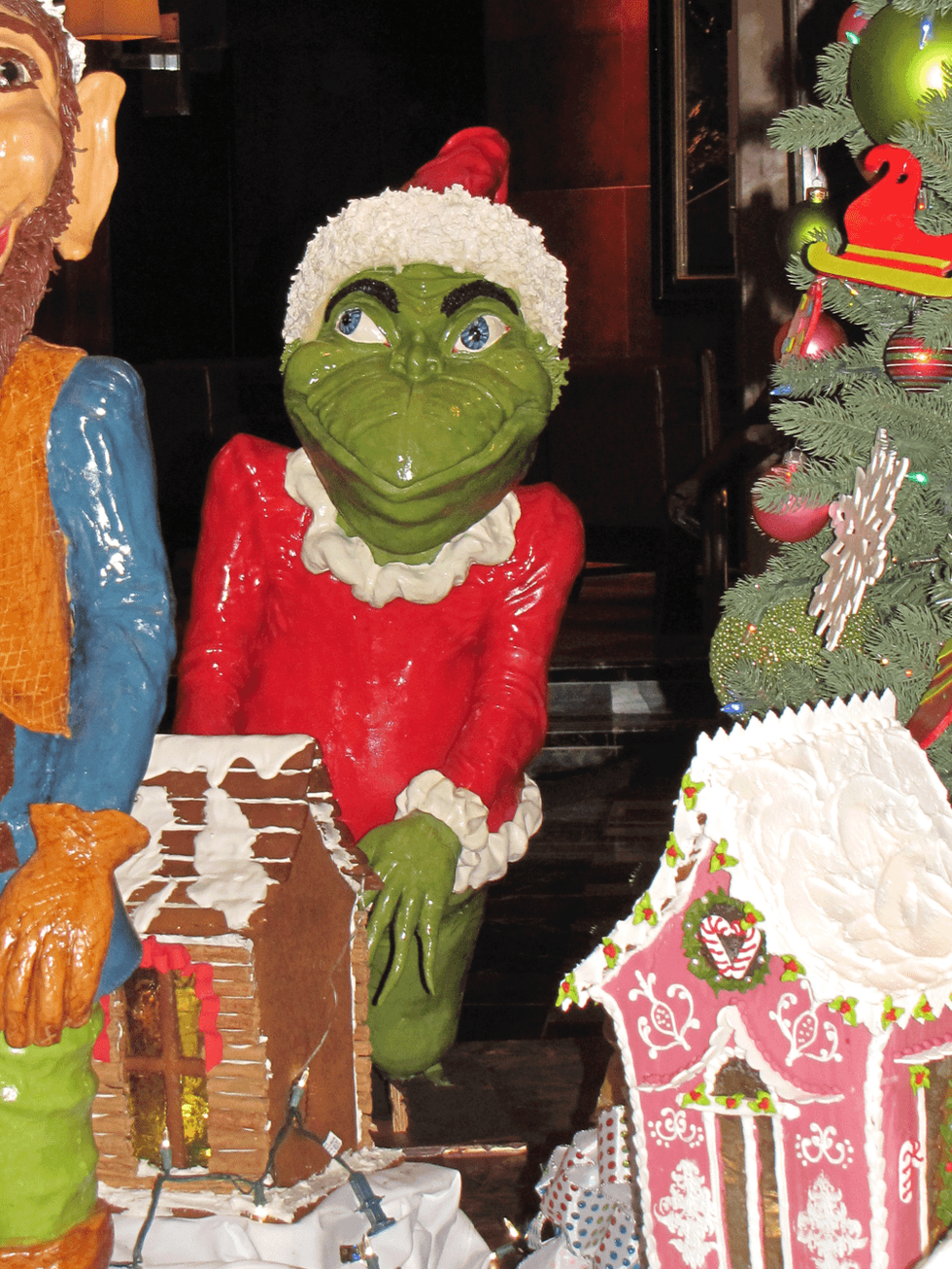 Hilton Americas Grinch at chocolate holiday display