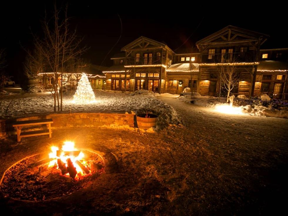 Hoffman - travel - Montana Ranch at Rock Creek - exterior cabin and fire