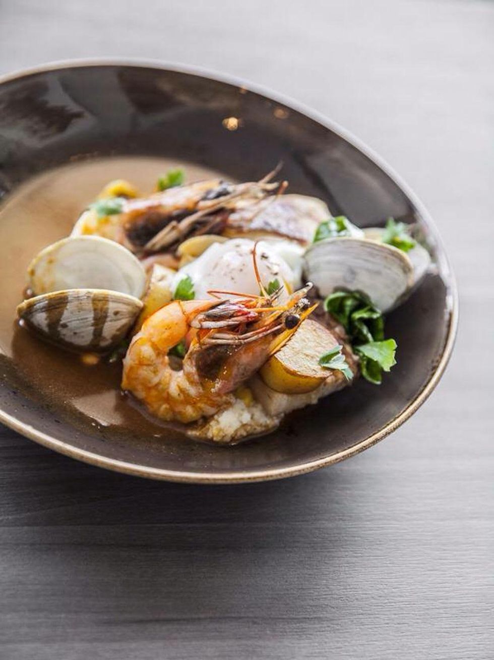 Holley's Seafood Restaurant & Oyster Bar muddled stew with braised pork belly, clams, gulf shrimp, red snapper, 13-minute egg, crab and tomato broth September 2014