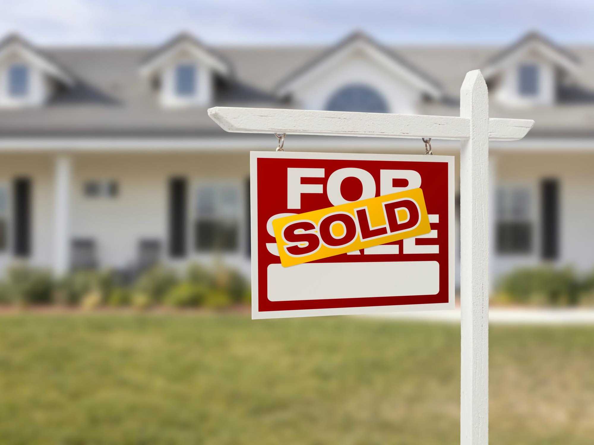 Home for sale sold sign