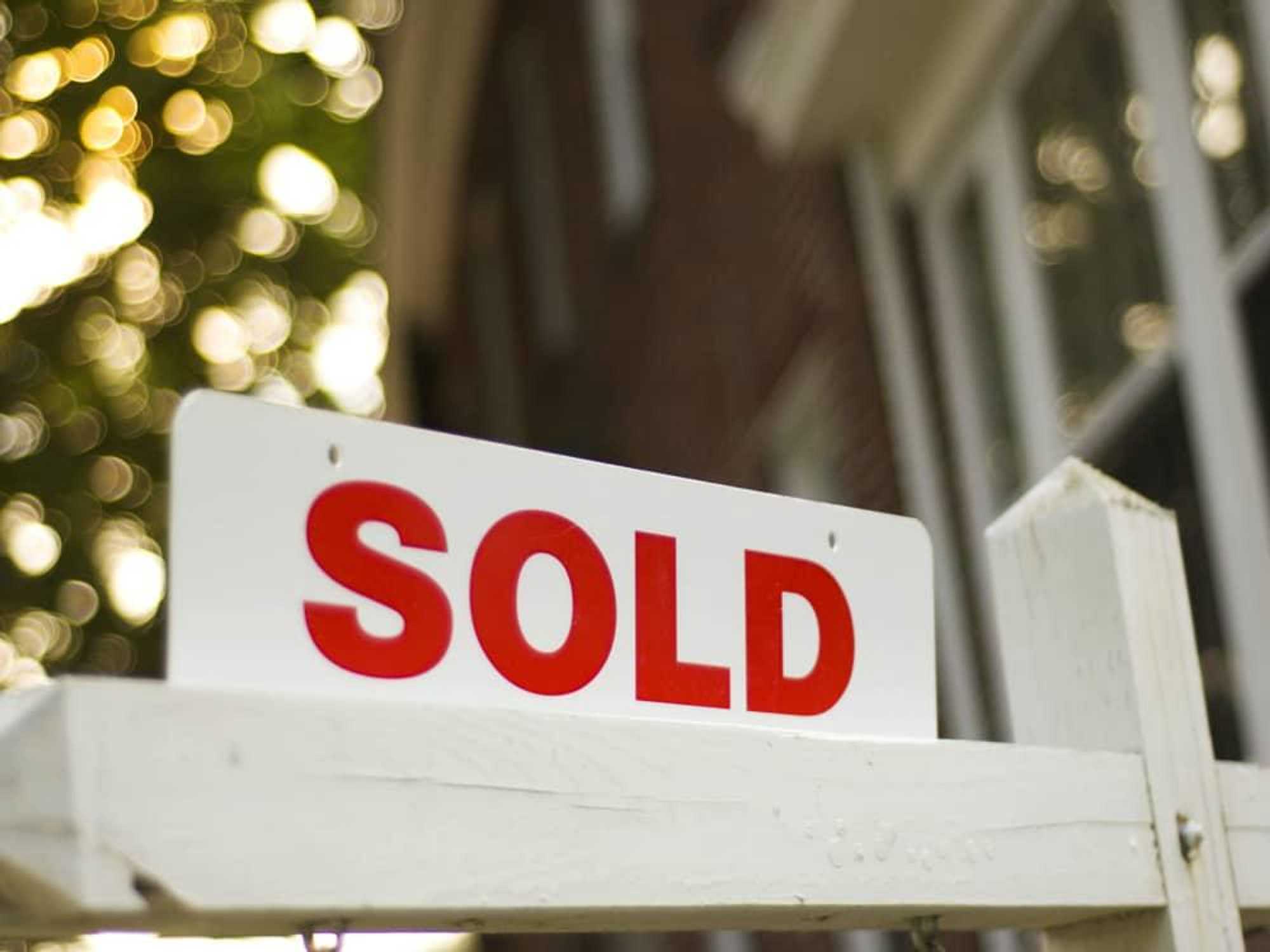 Home for sale sold sign