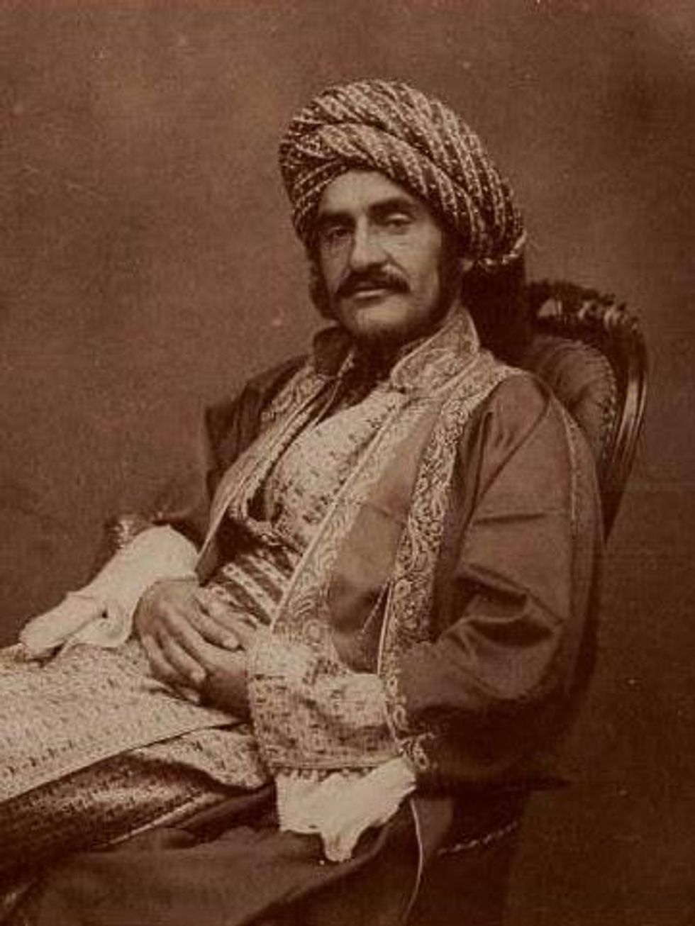 Hormuzd Rassam sitting