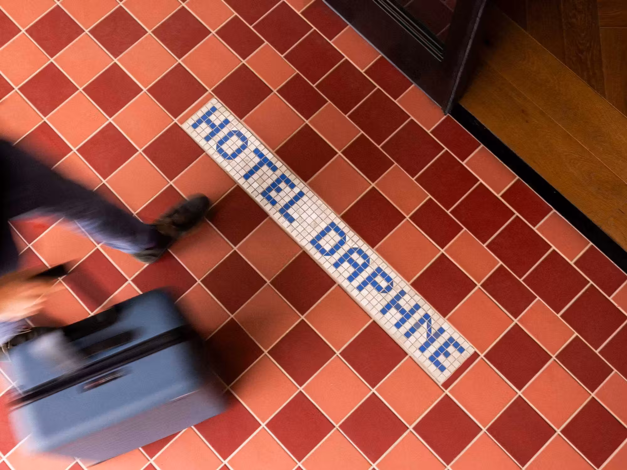 Hotel Daphne tile sign
