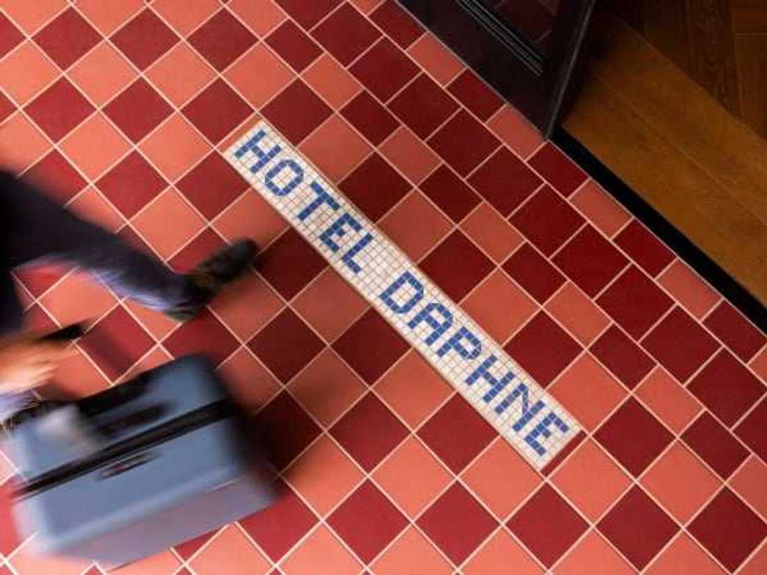 Hotel Daphne tile sign