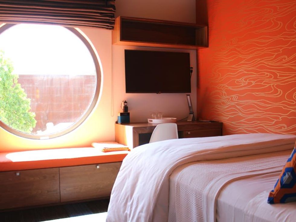Hotel Eleven 11th Street Austin 2016 guest bedroom small orange