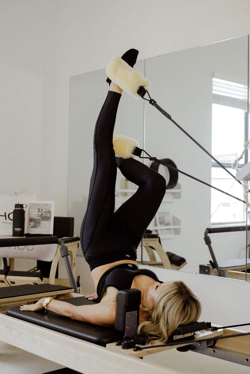 House of Core Houston founder Kim Yates on a Pilates Reformer