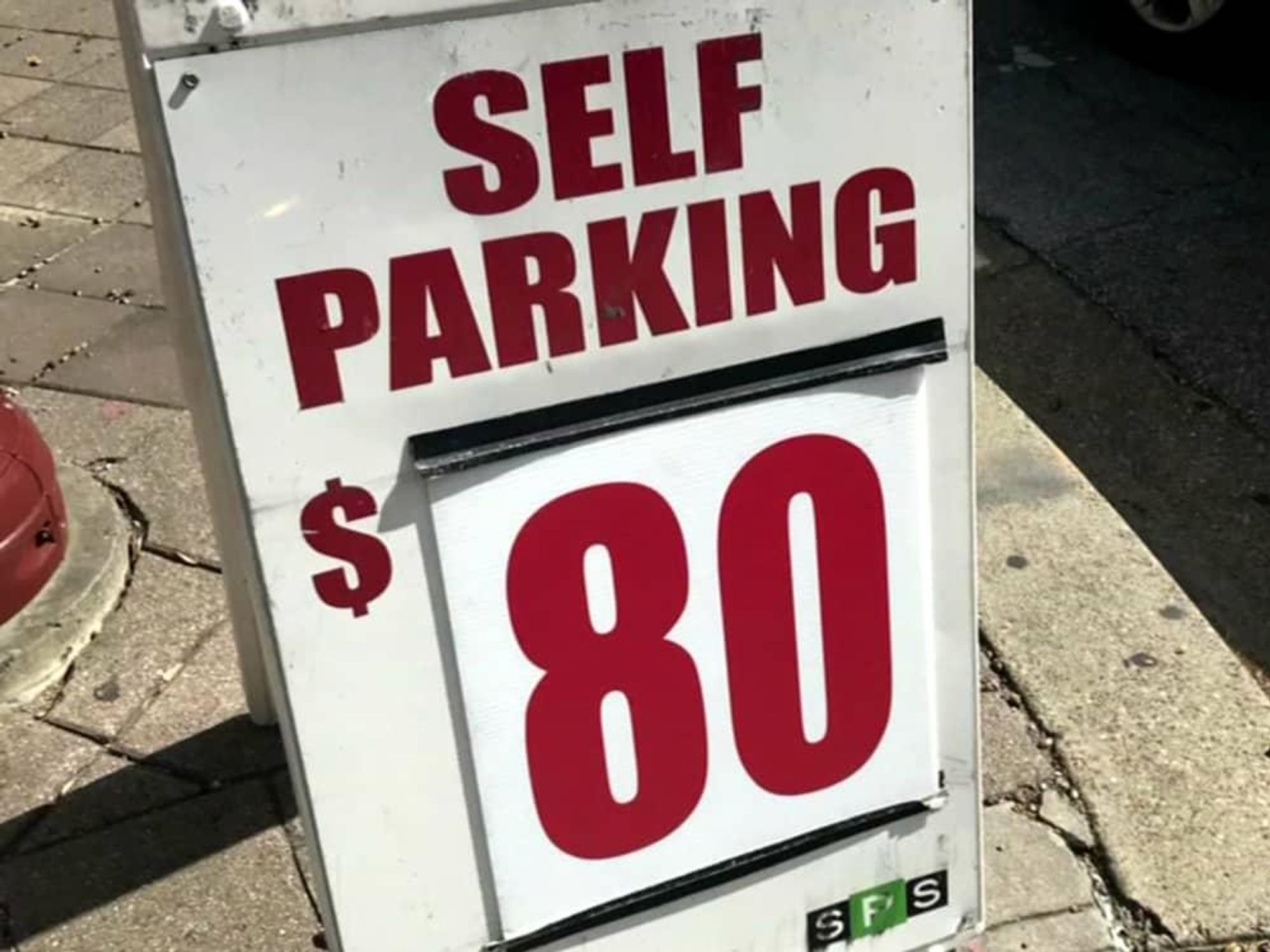 Houston Astros parking $80 sign downtown