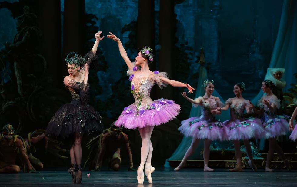 Houston Ballet Principals Melody Mennite as Carabosse and Soo Youn Cho as the Lilac Fairy with Artists of Houston Ballet in Ben Stevenson\u2019s The Sleeping Beauty.