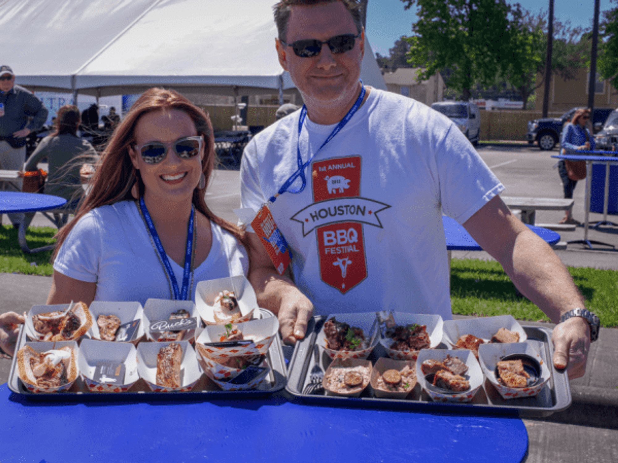 Houston Barbecue festival attendees with tray