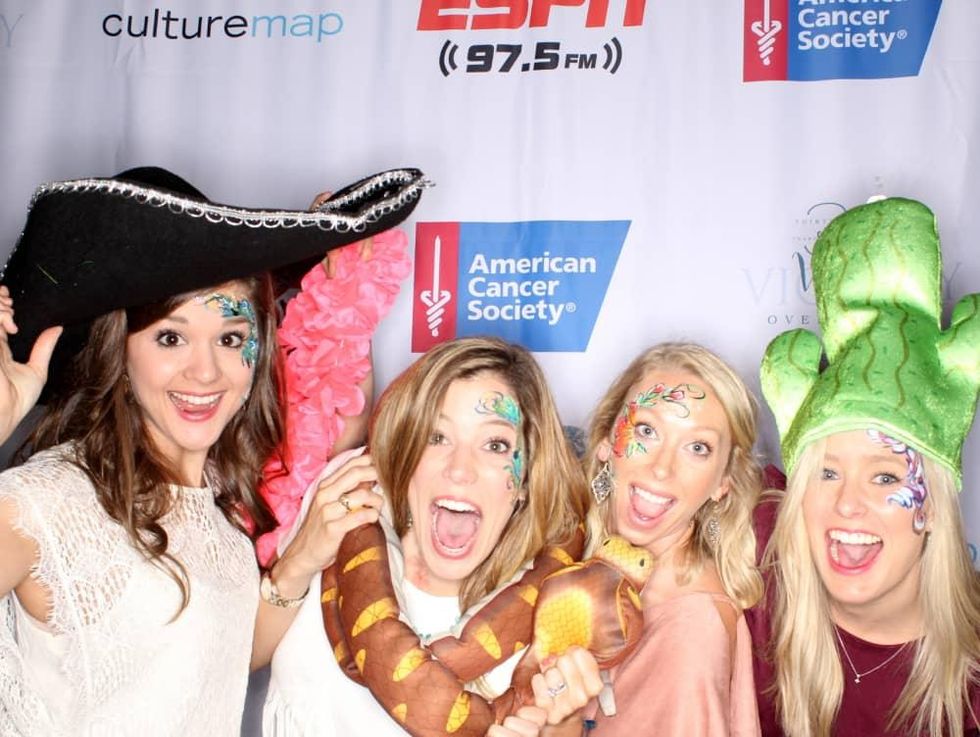 Houston, Cattle Barron's Ball 2017, May 2017, Partygoers have fun in the Photobooth