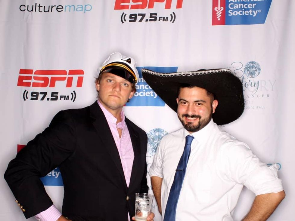 Houston, Cattle Barron's Ball 2017, May 2017, Partygoers have fun in the Photobooth