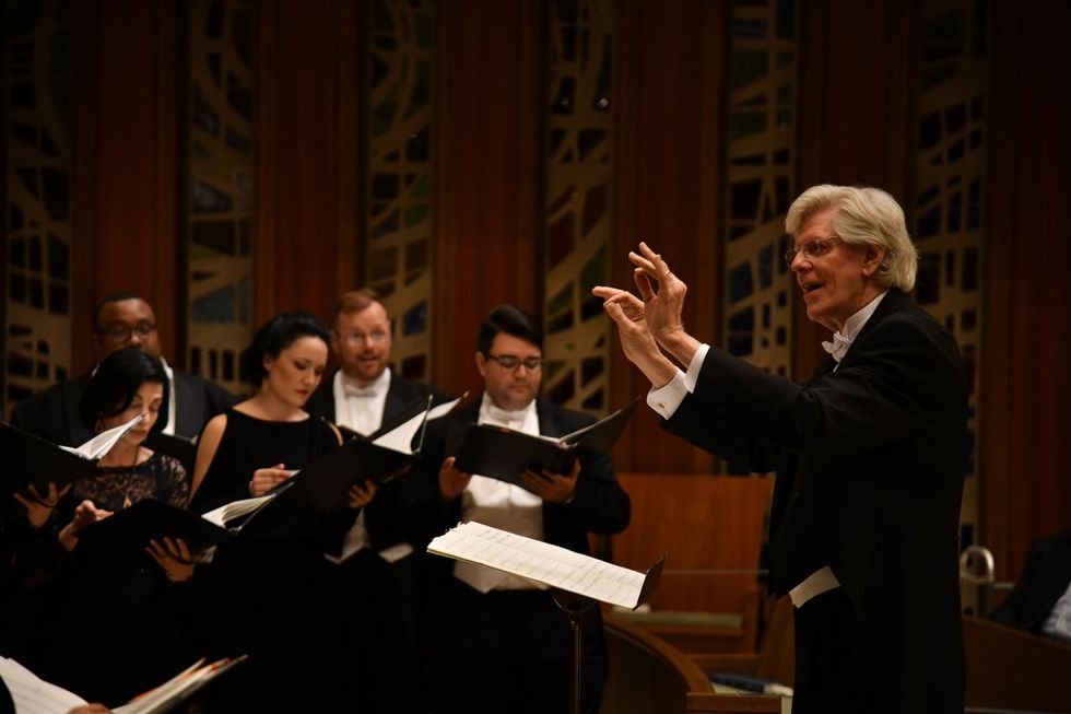 Houston Chamber Choir being conducted by director Robert Simpson