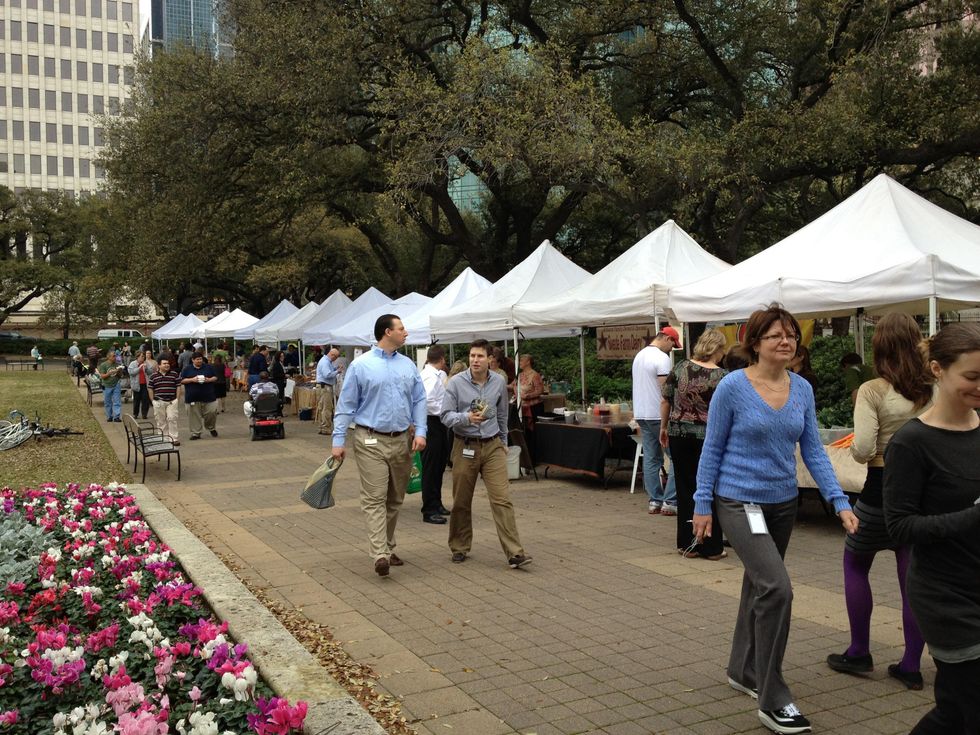 Houston City Hall farmers market with people and booths