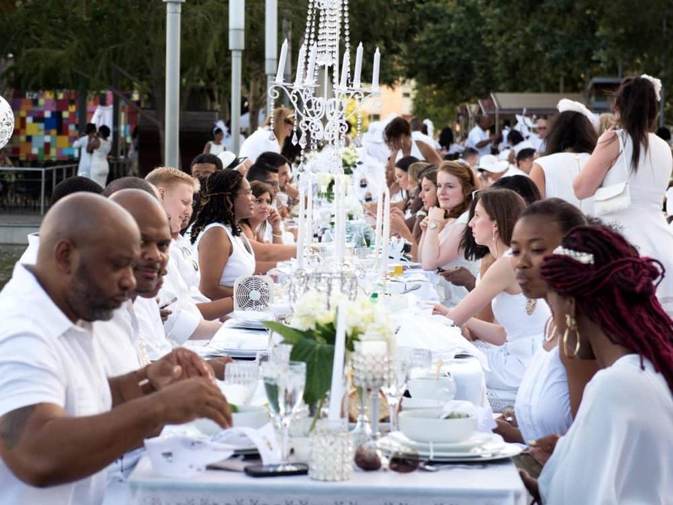 Très chic picnic with allwhite dress code takes over downtown park as