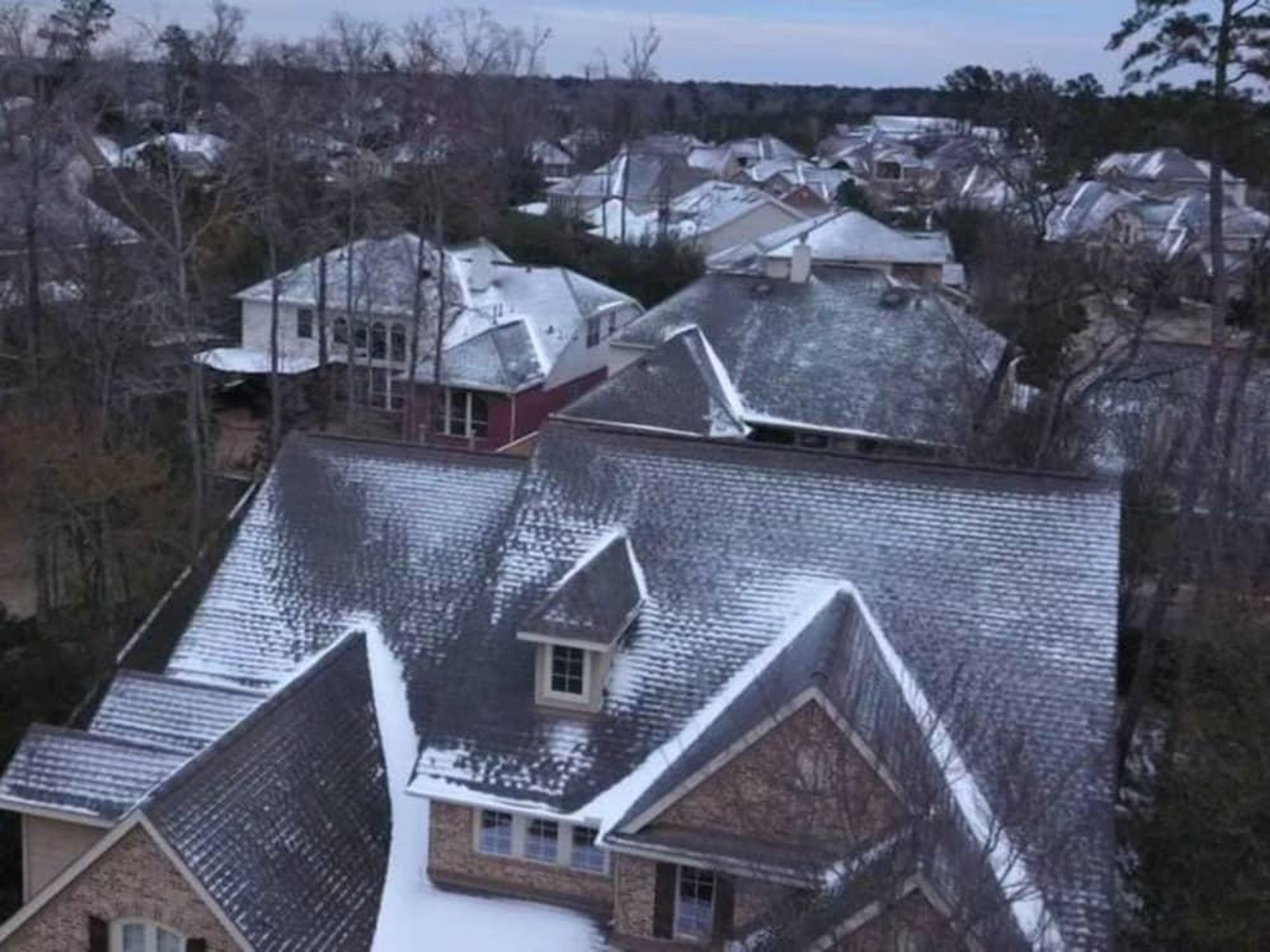 Houston drone footage ice on roofs ABC-13